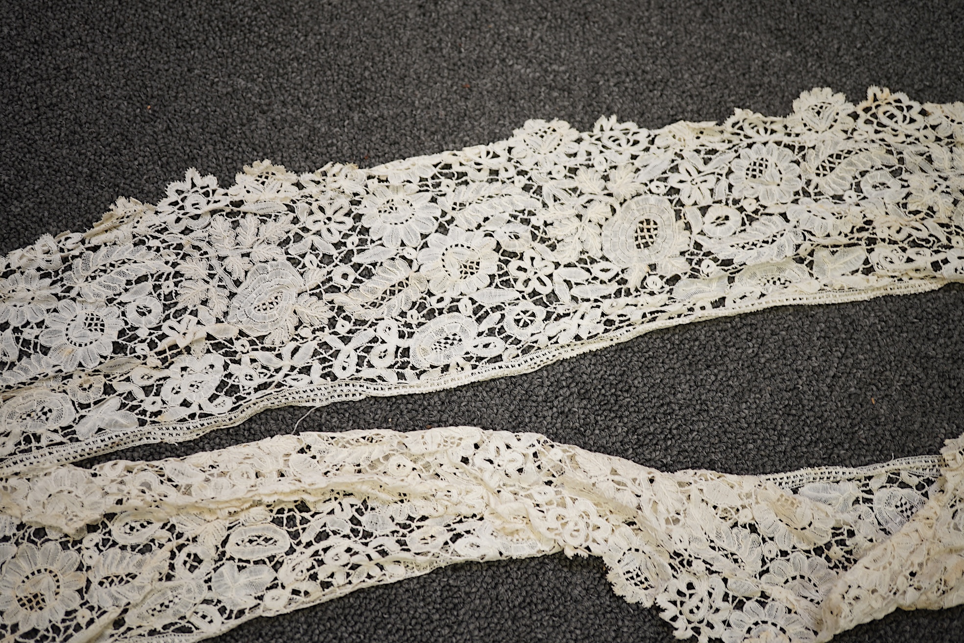 A mixed Brussels bobbin lace and Point de Gaze lace collar, another smaller collar, a similar length of trim and butterfly motif, together with a Brussels bobbin collar and trim, an Irish crochet cuffs, a Valenciennes la
